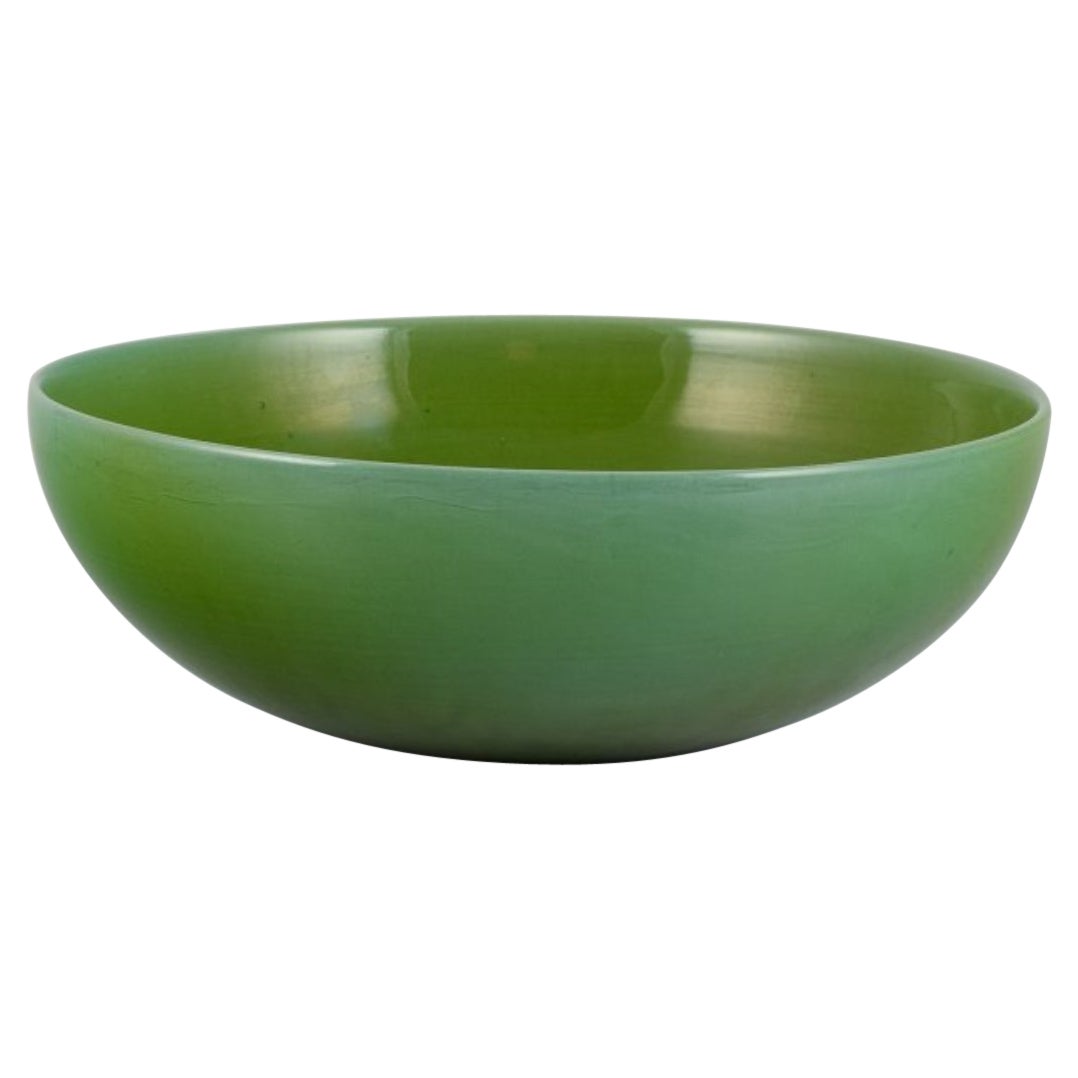 Carl Harry Stålhane for Rörstrand. Large ceramic bowl in apple green glaze For Sale