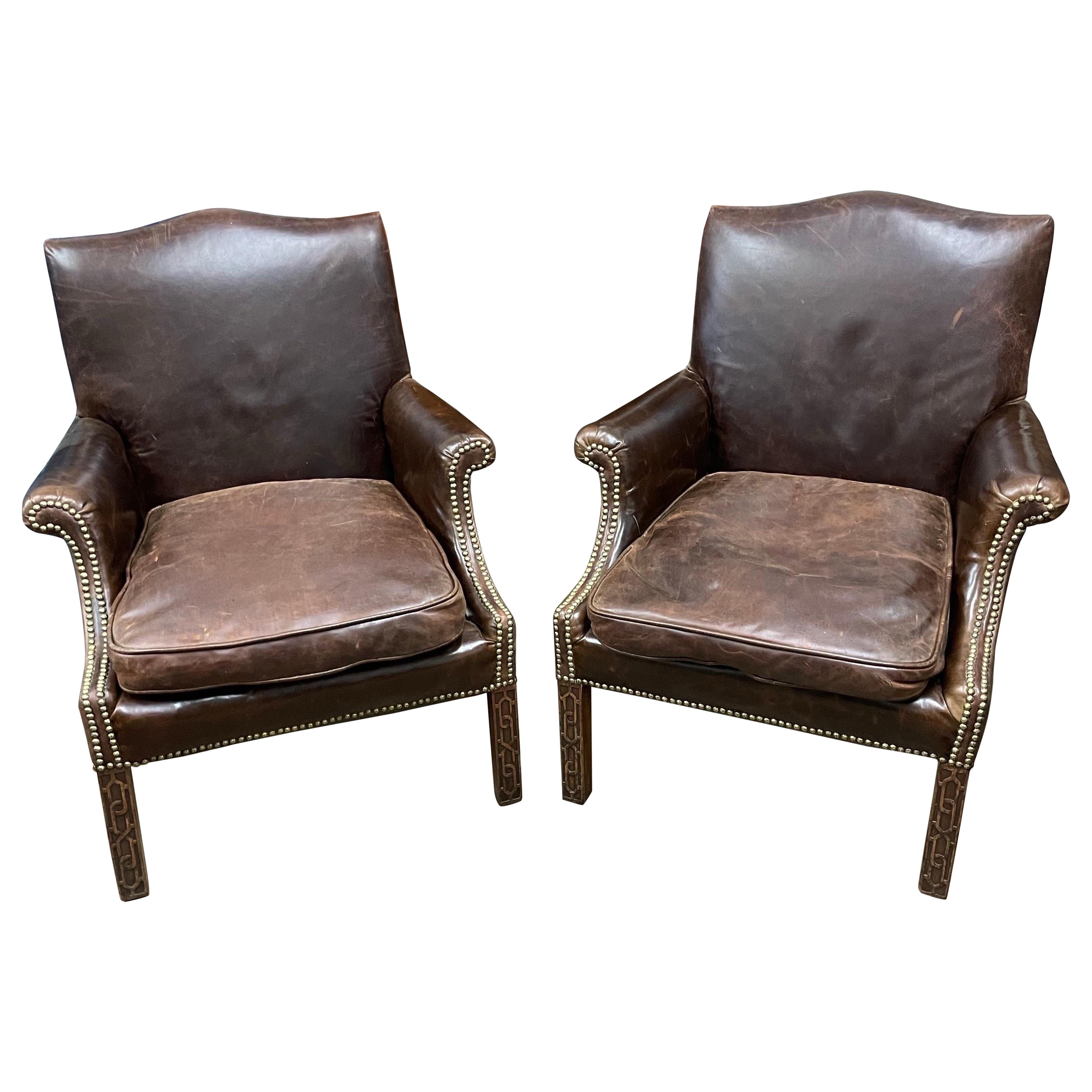 Pair George III style upholstered leather brass nailed armchairs For Sale
