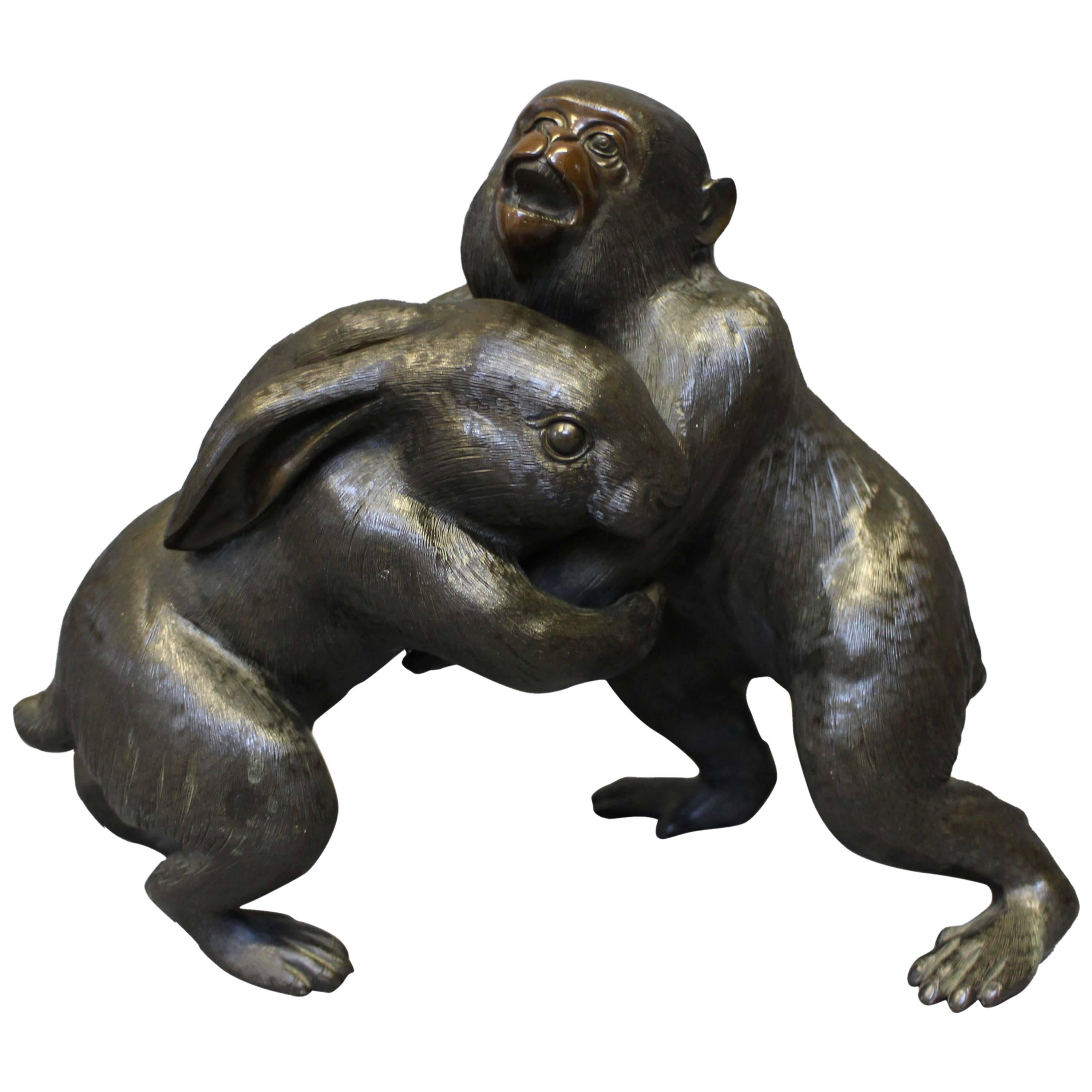 An unusual Antique Japanese Bronze of a Monkey and a Rabbit Wrestling For Sale