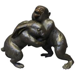 An unusual Antique Japanese Bronze of a Monkey and a Rabbit Wrestling