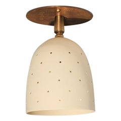 Modern spotlight with lacquered metal and patinated brass