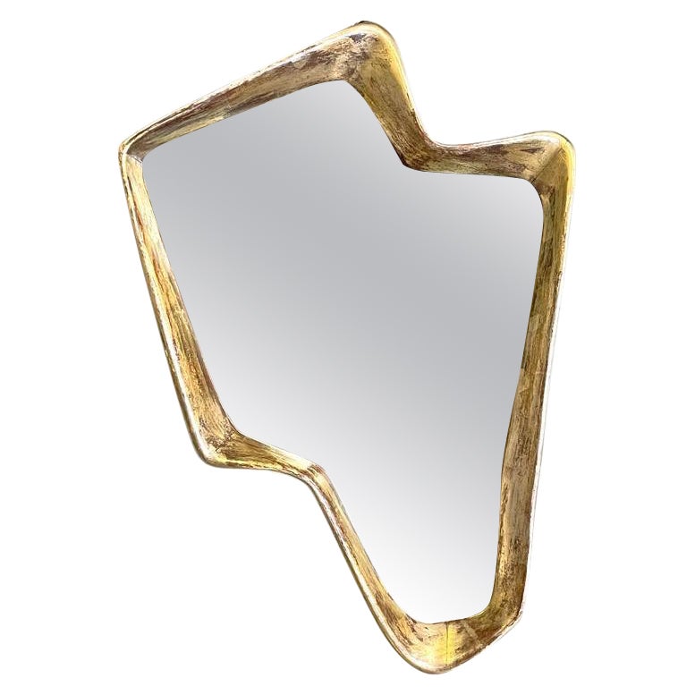 Italian Art Deco golden wood wall mirror with abstract curved structure, 1940s For Sale