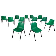 Used Italian modern Stackable chairs in green plastic and black metal, 2000s