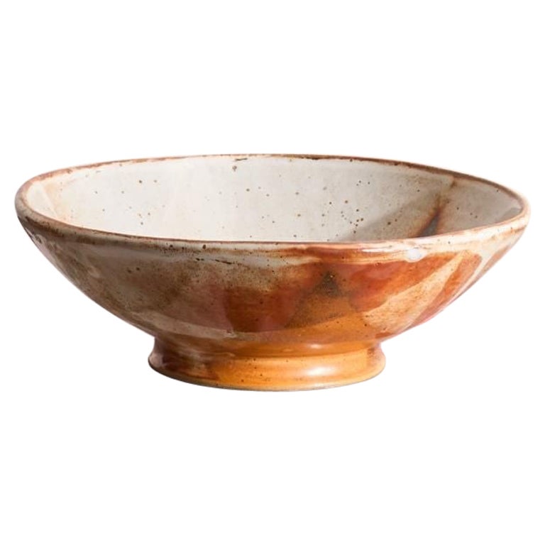 Vintage studio pottery bowl with orange decoration For Sale