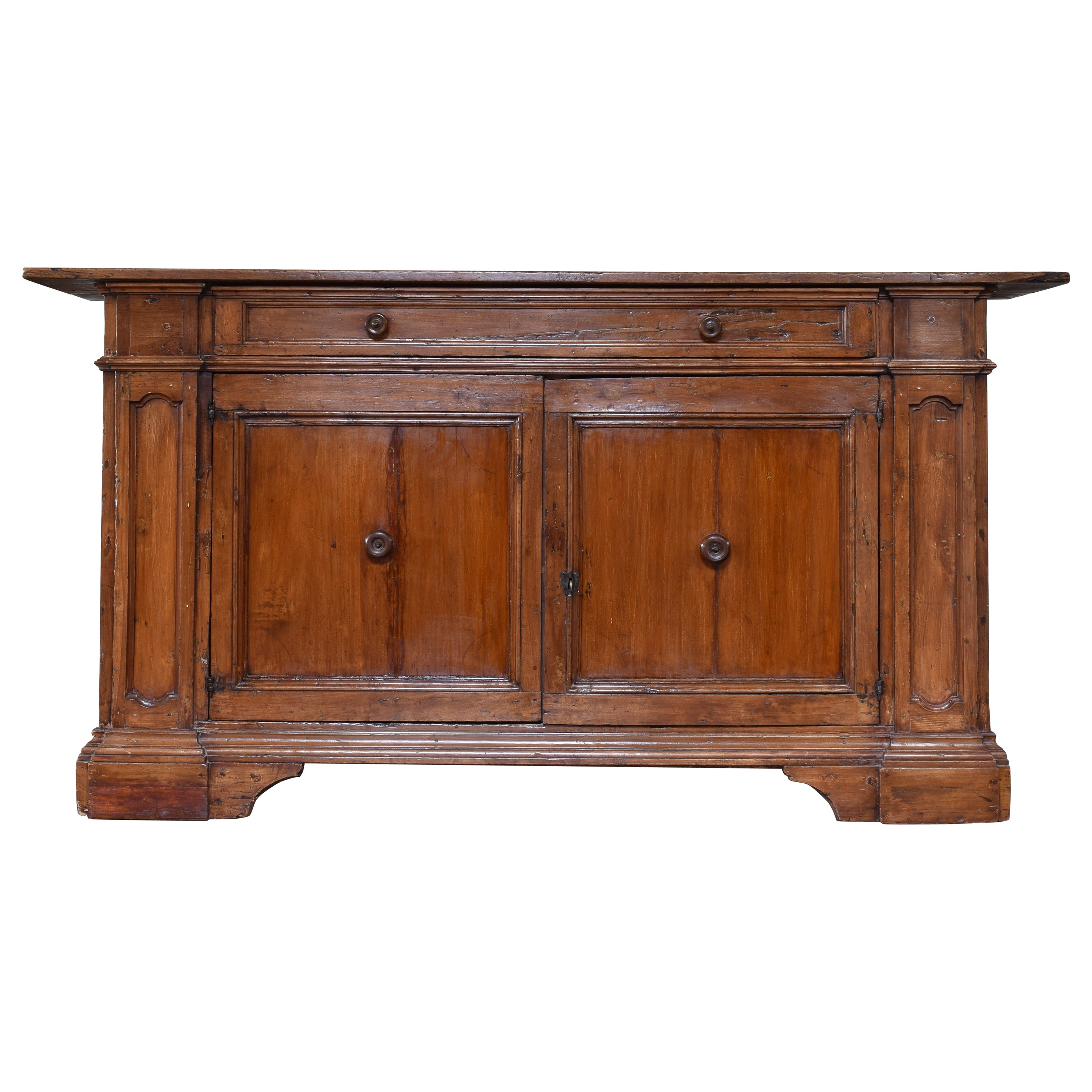 Crédence italienne en bois de sapin teinté de style baroque tardif à un tiroir et deux portes, début du XVIIIe siècle. en vente