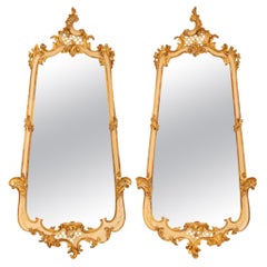 Antique true pair of Italian 19th century Louis XV st. patinated and Giltwood mirrors
