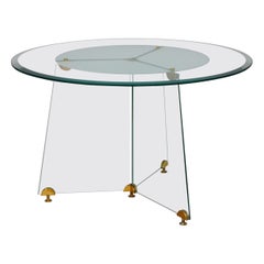 Table circulaire en verre et laiton