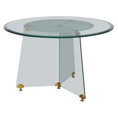 Mesa circular de cristal y latón