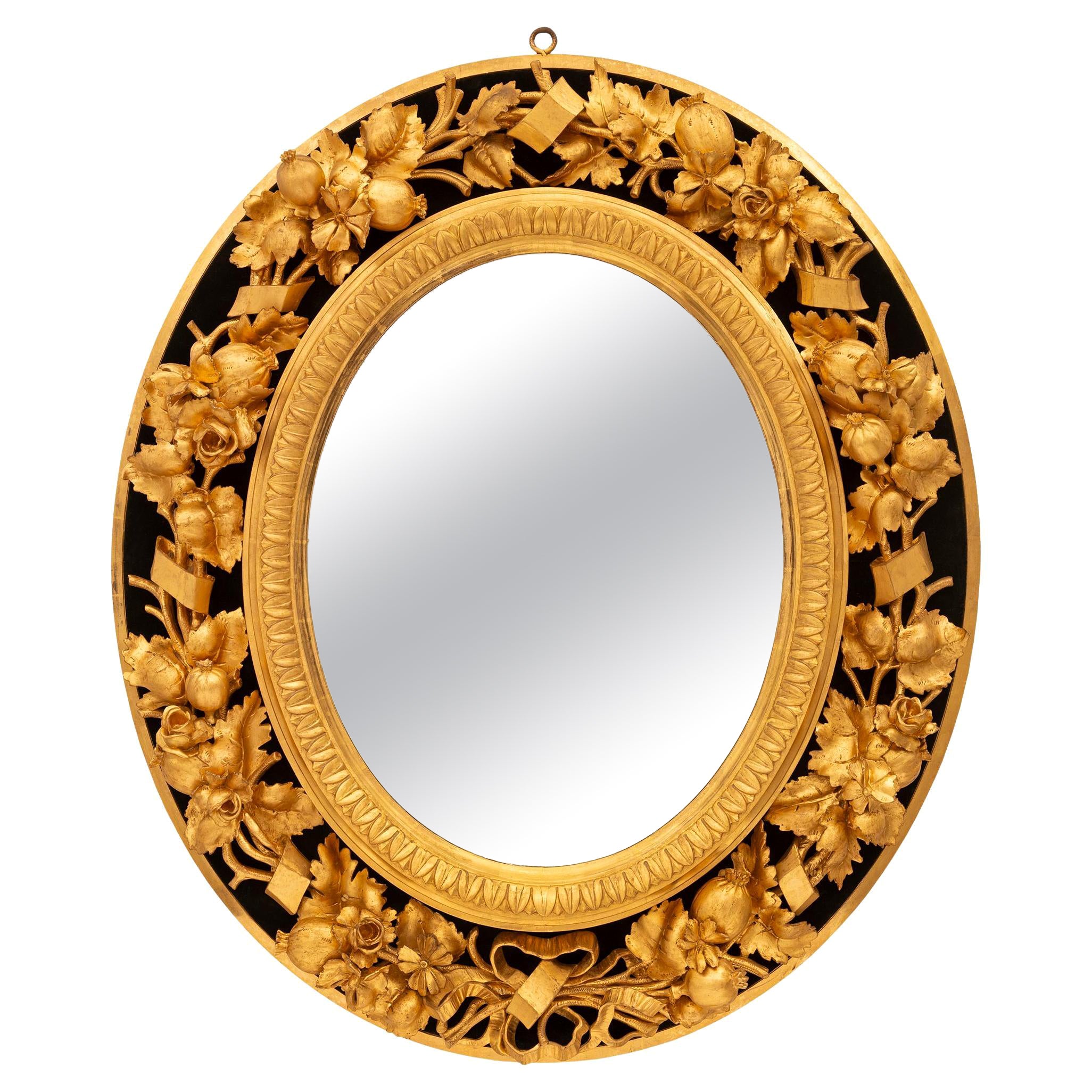 Italian early 19th century Giltwood and black Velvet mirror For Sale