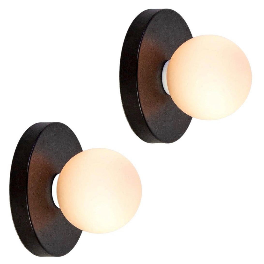 Pair of Globe Sconces by Research.Lighting, Black, In Stock For Sale