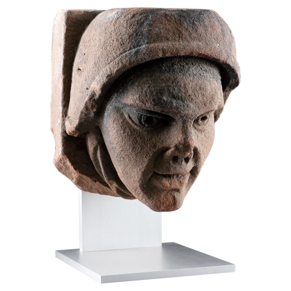 A Rare and Finely Carved Weser Renaissance Stone Head For Sale