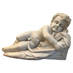 Vintage Marble sleeping Cupid Statue in the style of François Duquesnoy