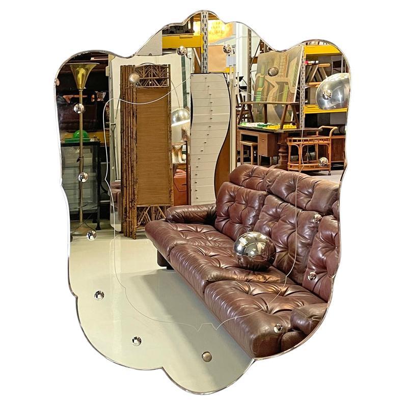 Italian Art Deco shield-shaped wall mirror with round decorations, 1940s For Sale