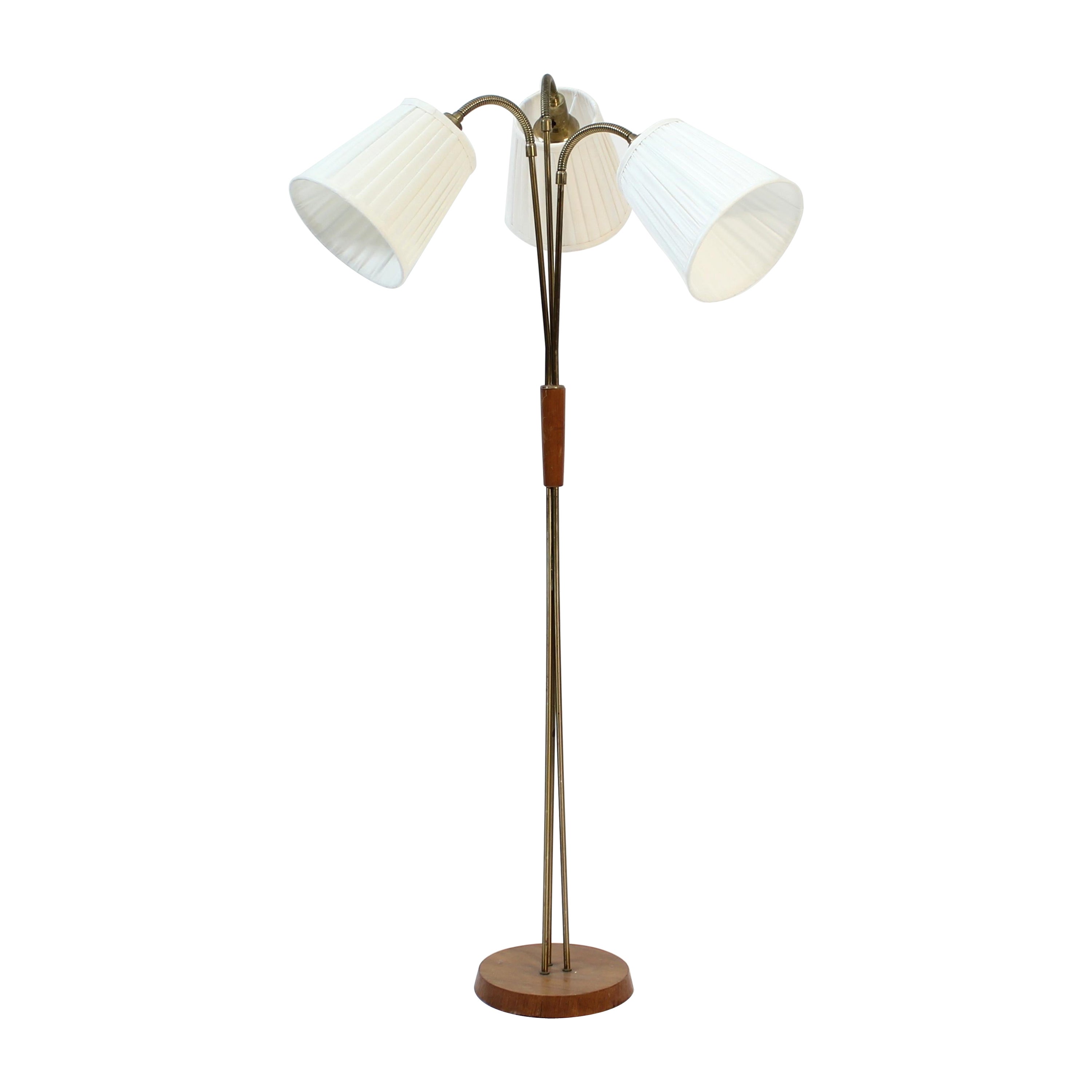 Scandinavian mid-century 3-light floor lamp, teak and brass, 1950s For Sale