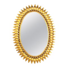Miroir ovale en métal doré, Espagne, années 1950