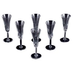 Saint Louis, France. Set of six champagne flutes in cut crystal glass. 
