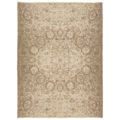 Tapis contemporain en laine tissé à la main en beige avec design central