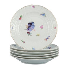 Meissen, Germany. A set of six antique deep porcelain dinner plates. 