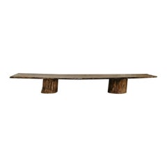 customized coffee/console table,  19th century table top on pine treetrunks