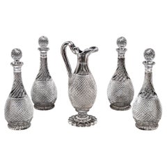 Antique A Set of Four Diamond & Swirl Cut Decanters With Corresponding Wine Ewer