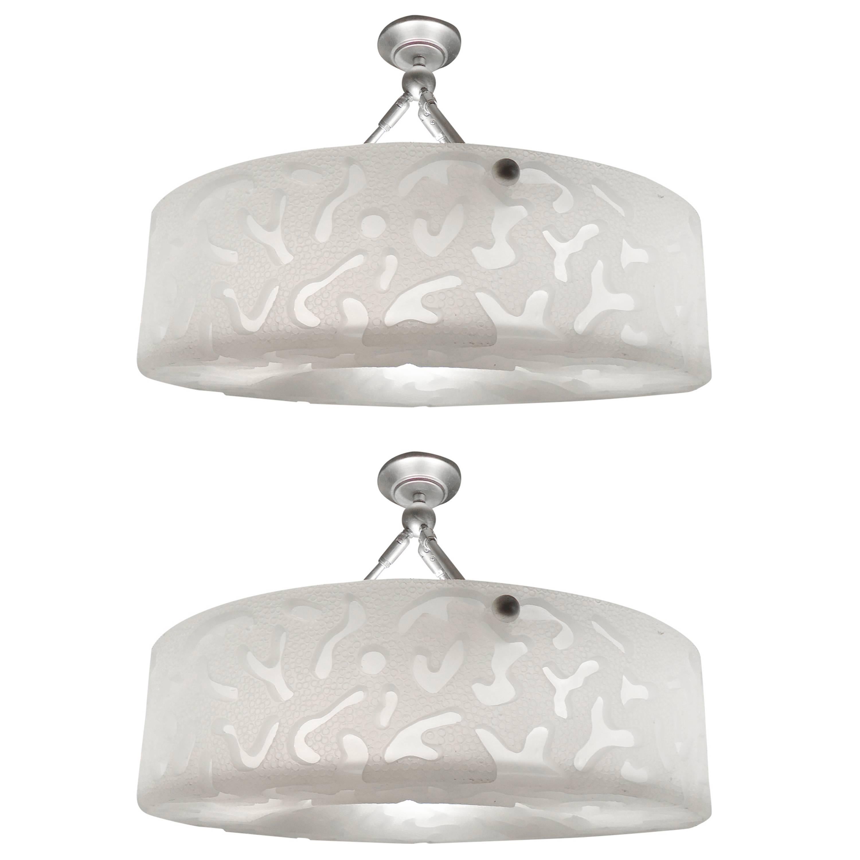 Pair of Textured Lucite Chandeliers