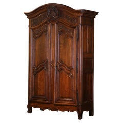 Antique Mid-18th Century French Louis XV Carved Walnut Two-Door "Armoire Lyonnaise"