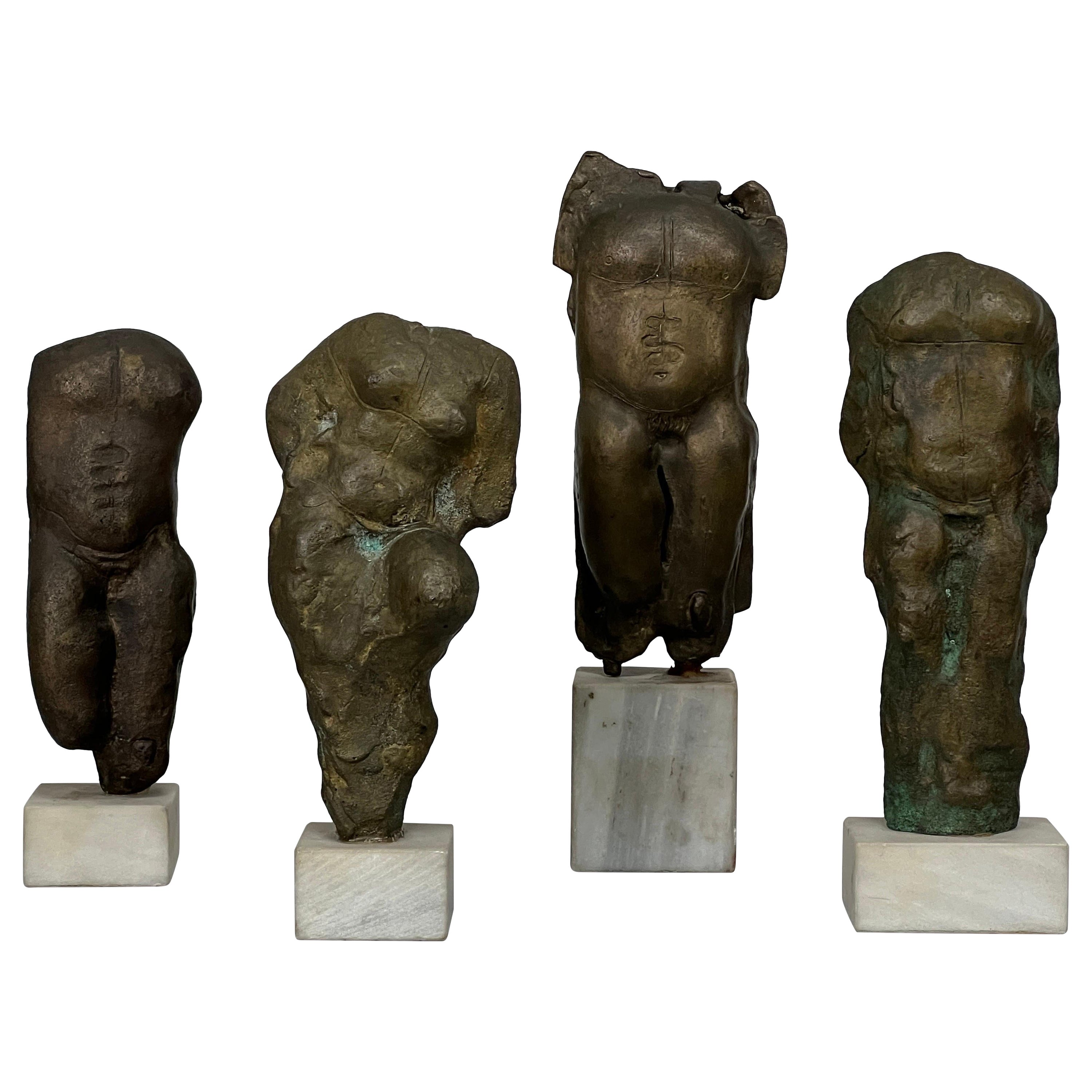 Four Bronze Torso Sculptures on Marble Bases For Sale