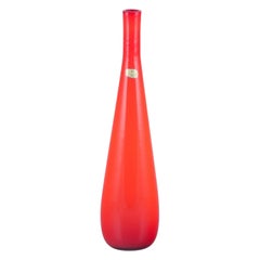 Vintage Murano, Italy. Large art glass vase with a slender neck in orange glass.