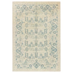 Spanischer Teppich aus der Mitte des Jahrhunderts, blau, elfenbeinfarben, handgefertigt aus Wolle
