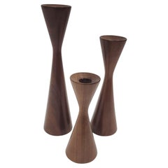 Trio of scandinavian style walnut candlesticks 