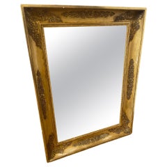 Decorative antique French mirror in the Empire style 