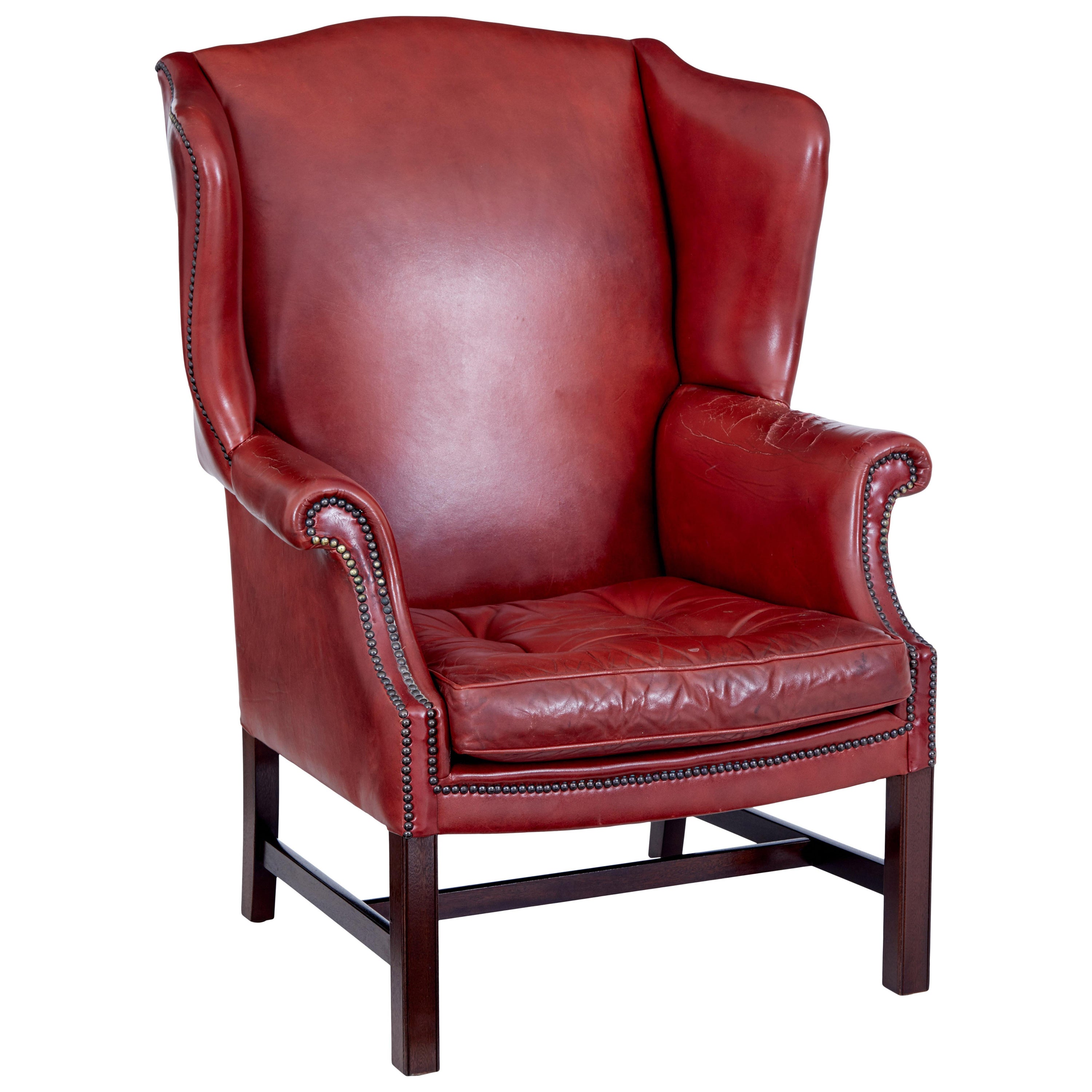 Mid 20th century leather wingback armchair For Sale