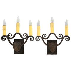 Pair of 1920s Wrought Iron Triple Light Sconces with Shield Motif