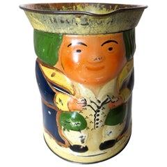 "Toby" Jug Still Bank and Biscuit Tin, circa 1910