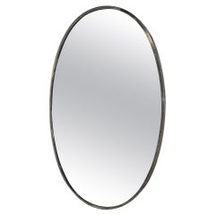 Miroir ovale italien du milieu du siècle 1960