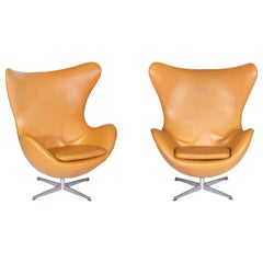 Pair of Retro Leather "EGG" Lounge Chairs by Fritz Hansen