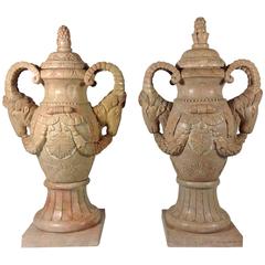 Commanding Pair of Lidded Ram's Urns