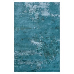 Tapis Infinity Horizon bleu Capri & Paon 150x240 cm touffeté à la main