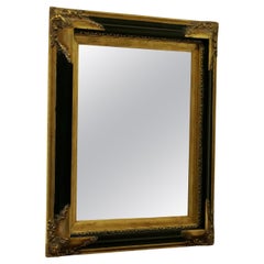 An Elegant Regency Gilt and Black Wall Mirror  This is a superb quality piece, t