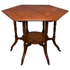 Antique Collinson & Lock attributed. An Aesthetic Movement walnut octagonal center table