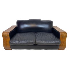 Grand canapé en bois courbé Art déco en cuir vieilli 