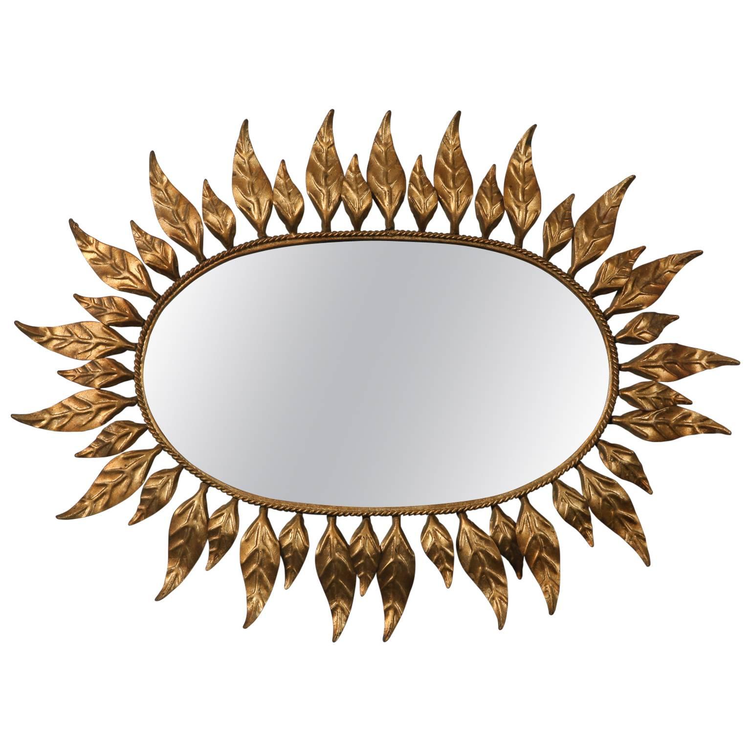Midcentury Oval Mirror with Gilded Leaf Form Sunburst Frame