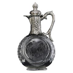 Verseuse ancienne en argent et verre taillé pour le vin de bordeaux