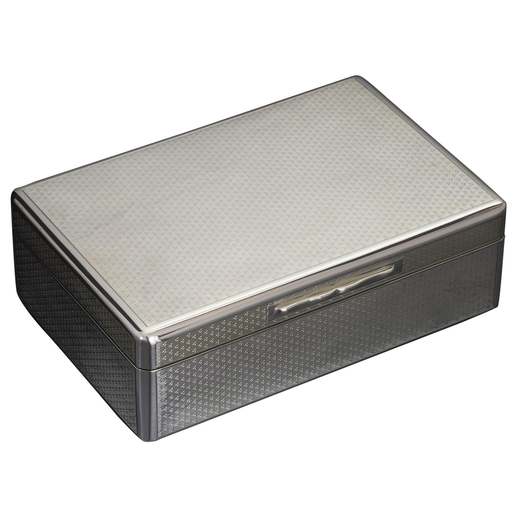 Engine-turned silver cigarette box For Sale