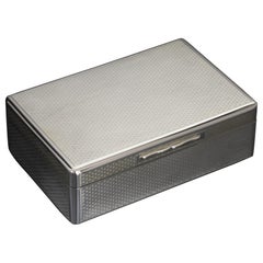 Engine-turned silver cigarette box