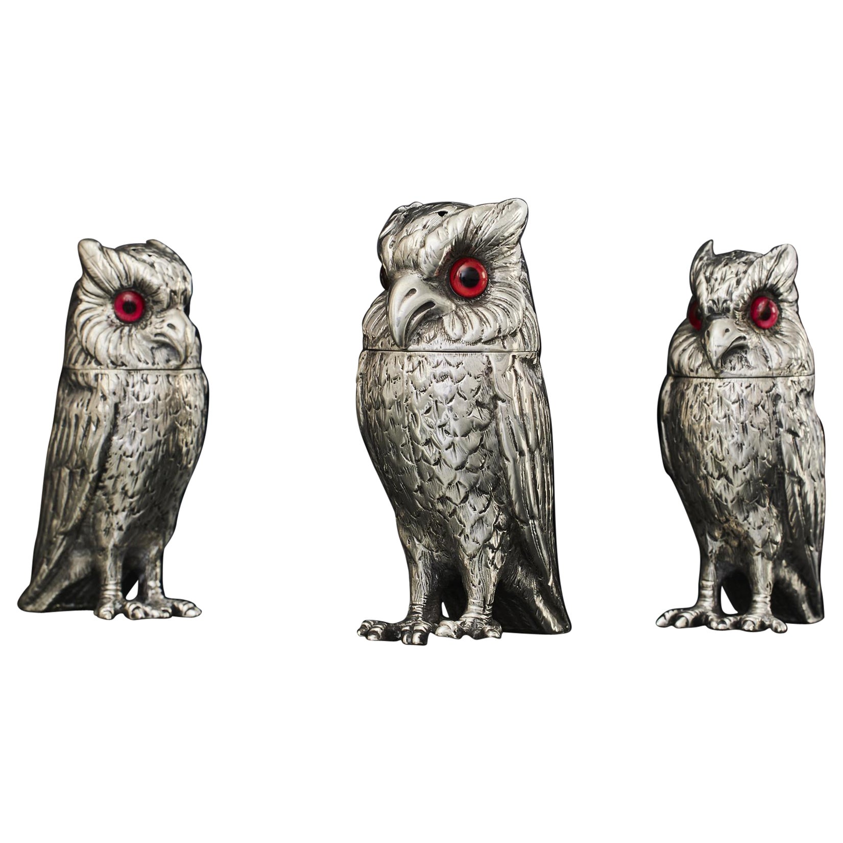Set of three antique silver owl pepper casters For Sale