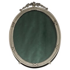 Used oval silver photograph frame