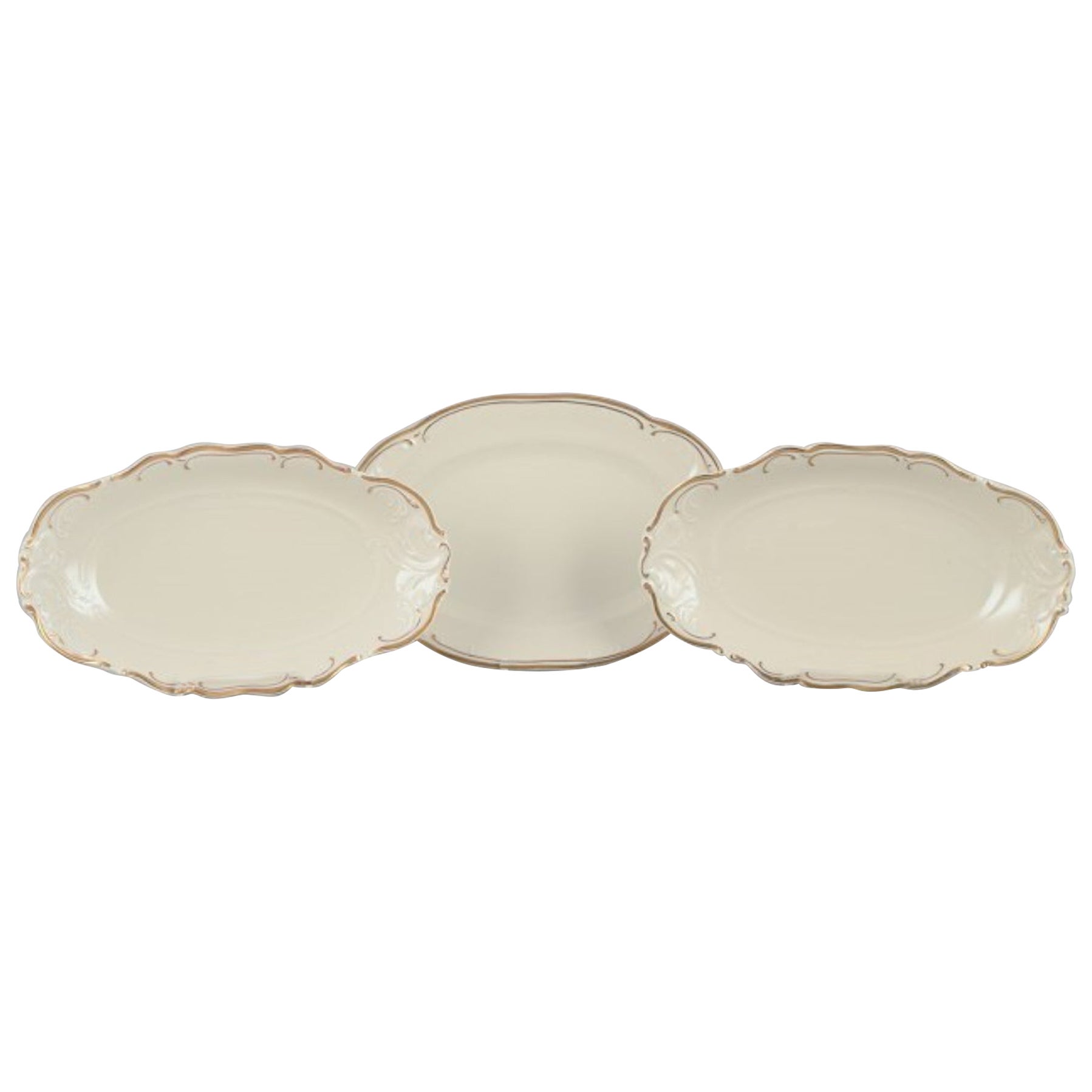 KPM, Poland. Three oblong porcelain platters.  For Sale