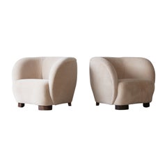 Ein Paar Sessel mit Polsterung aus reinem Alpaka