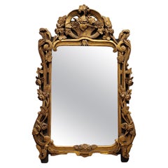  Grand miroir français de style Régence sculpté et doré